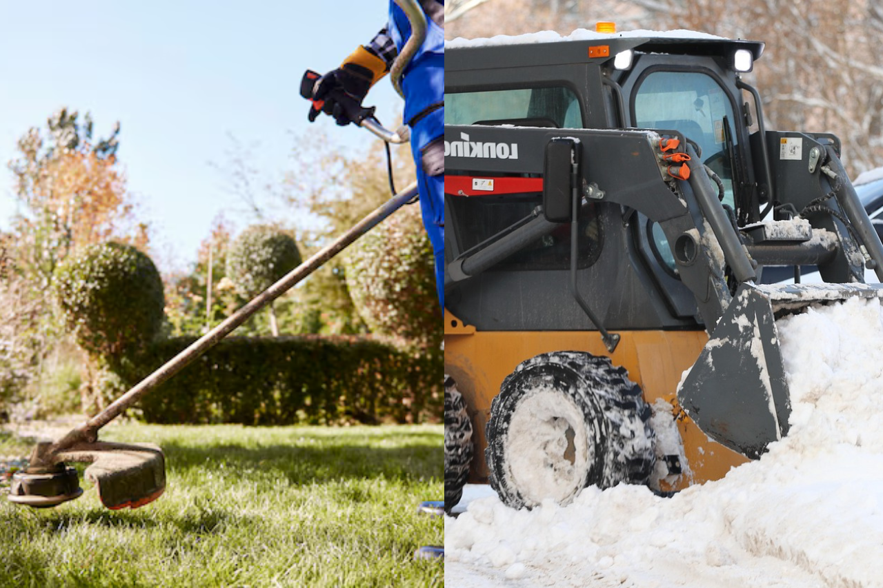 Professional skid steer loader clearing snow with landscaped green areas in background showing winter maintenance and landscaping services